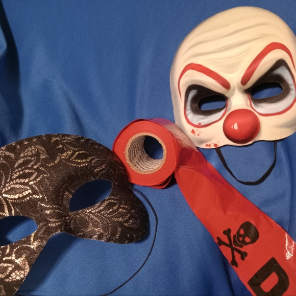 Two Halloween mask in good condition and danger and skull bones tape. - Picture 4 of 4